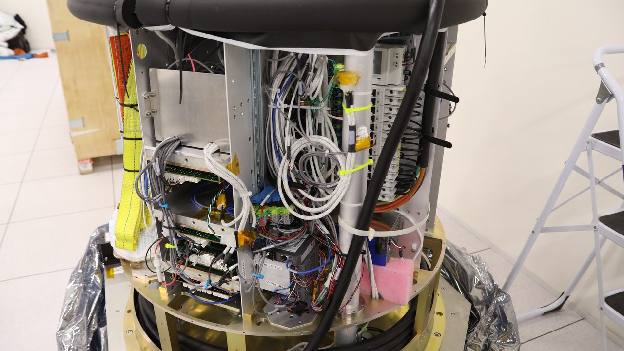 Rows of network server racks in a data center — representing the processor connections an NMI gateway transaction is routed across